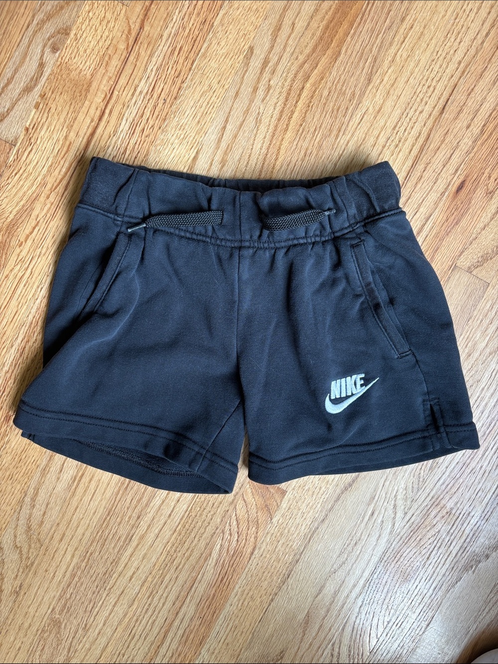 Nike small girls Black Athletic Shorts with White Logo